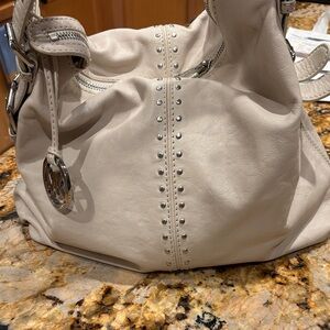Soft cream colored leather…MICHAEL Michael Kors